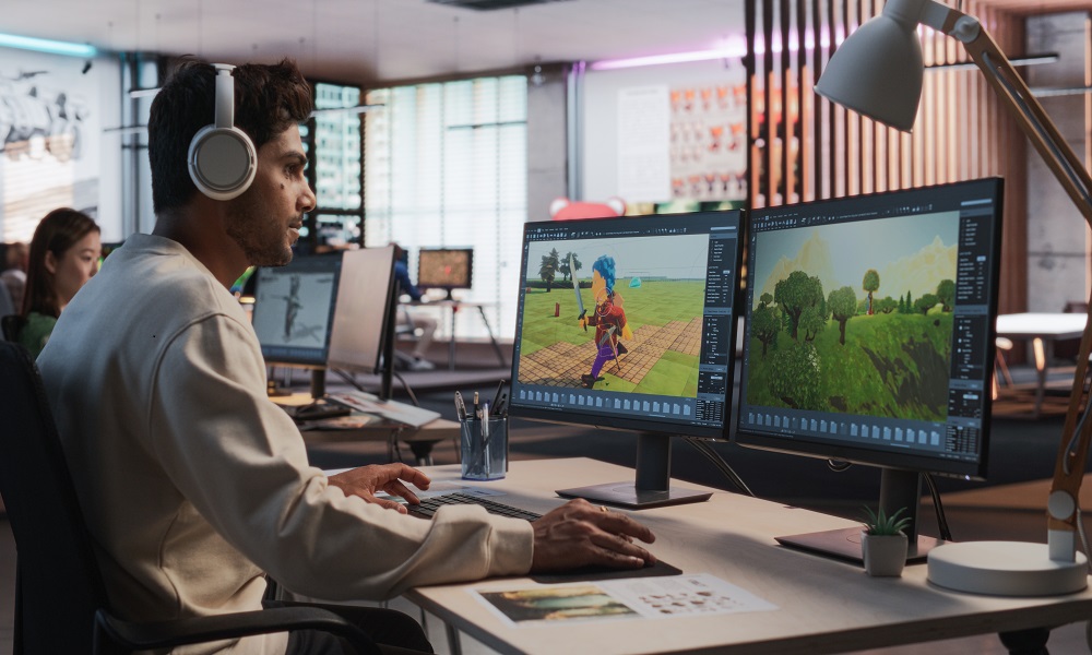 A senior graphics software engineer debugging a real-time 3D simulation matrix on a localized terminal, optimizing polygon render pipelines and asset physics boundaries across high-resolution development displays.